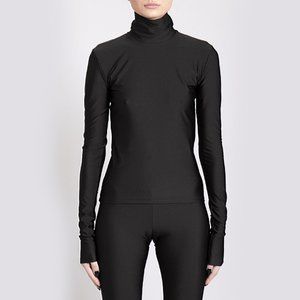 THE ANDAMANE Halle Shiny Turtleneck Top